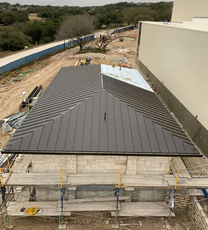 Metal roof new construction with scaffolding in Glencoe
