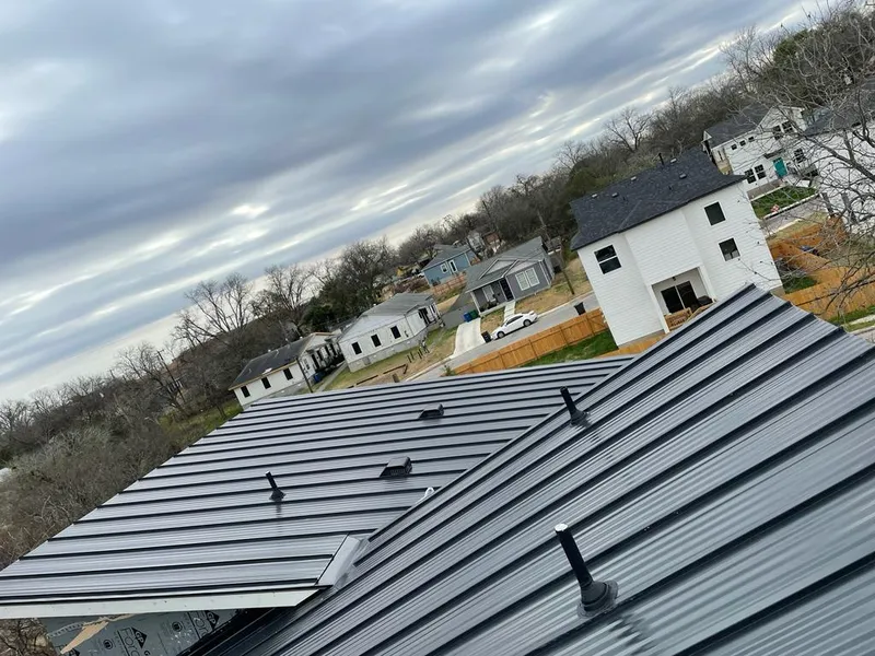 Standing seam metal roof panels with vents for Skylight Repair in Glencoe